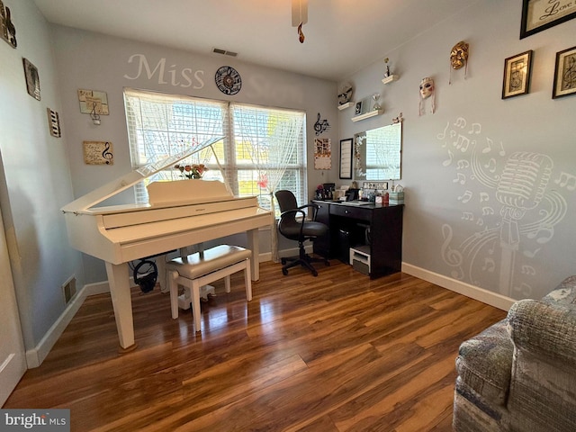 office space with dark hardwood / wood-style flooring