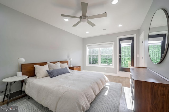 bedroom featuring light wood-type flooring and ceiling fan