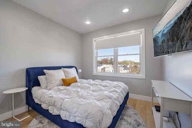 bedroom featuring light wood-type flooring