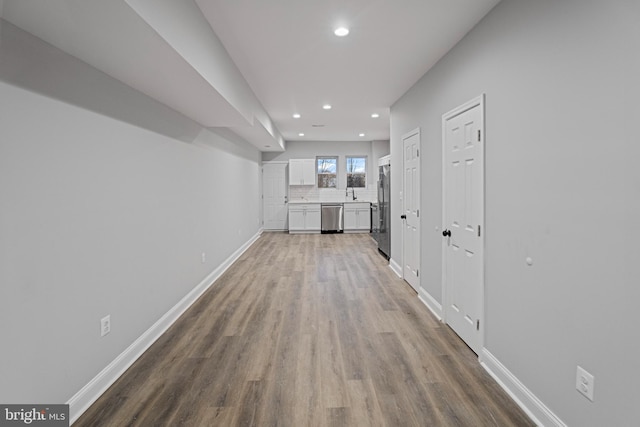 hall featuring wood-type flooring