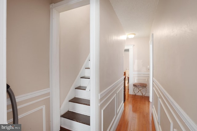 staircase featuring hardwood / wood-style flooring