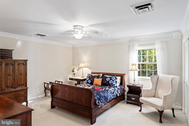 carpeted bedroom featuring crown molding and ceiling fan