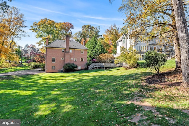 view of yard with a deck