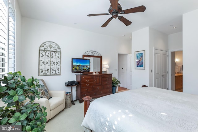 143 Waterfront St Unit 502, National Harbor, MD 20745 - carpeted bedroom featuring ceiling fan, connected bathroom, and recessed lighting