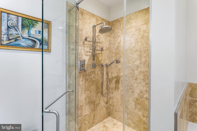 bathroom featuring an enclosed shower