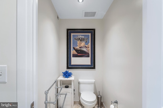 143 Waterfront St Unit 502, National Harbor, MD 20745 - bathroom featuring toilet and baseboards