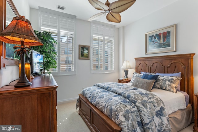 143 Waterfront St Unit 502, National Harbor, MD 20745 - carpeted bedroom with baseboards and ceiling fan