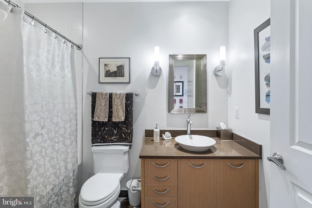 143 Waterfront St Unit 502, National Harbor, MD 20745 - full bathroom featuring toilet, vanity, and a shower with shower curtain