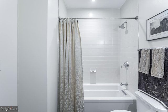 143 Waterfront St Unit 502, National Harbor, MD 20745 - bathroom featuring toilet and shower / tub combo with curtain