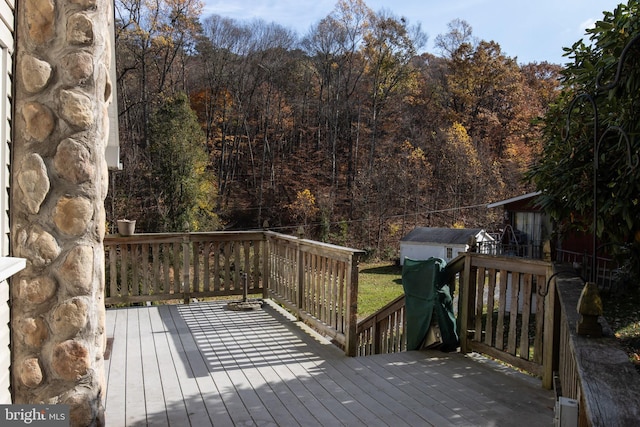 30 Sunset Ln, Catawissa, PA 17820 - wooden deck featuring an outdoor structure, a forest view, and a shed