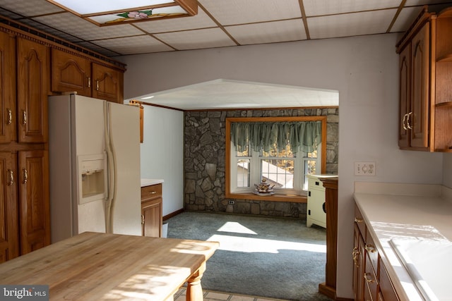 30 Sunset Ln, Catawissa, PA 17820 - kitchen featuring a sink, brown cabinetry, carpet, white refrigerator with ice dispenser, and wooden counters