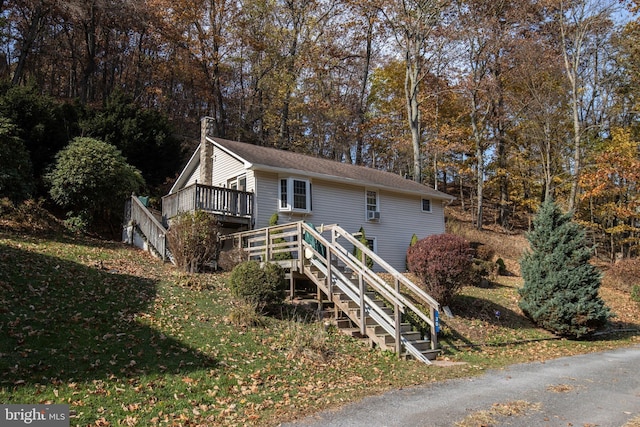 30 Sunset Ln, Catawissa, PA 17820 - exterior space featuring a chimney, stairs, and a wooden deck