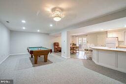 game room featuring billiards and light colored carpet