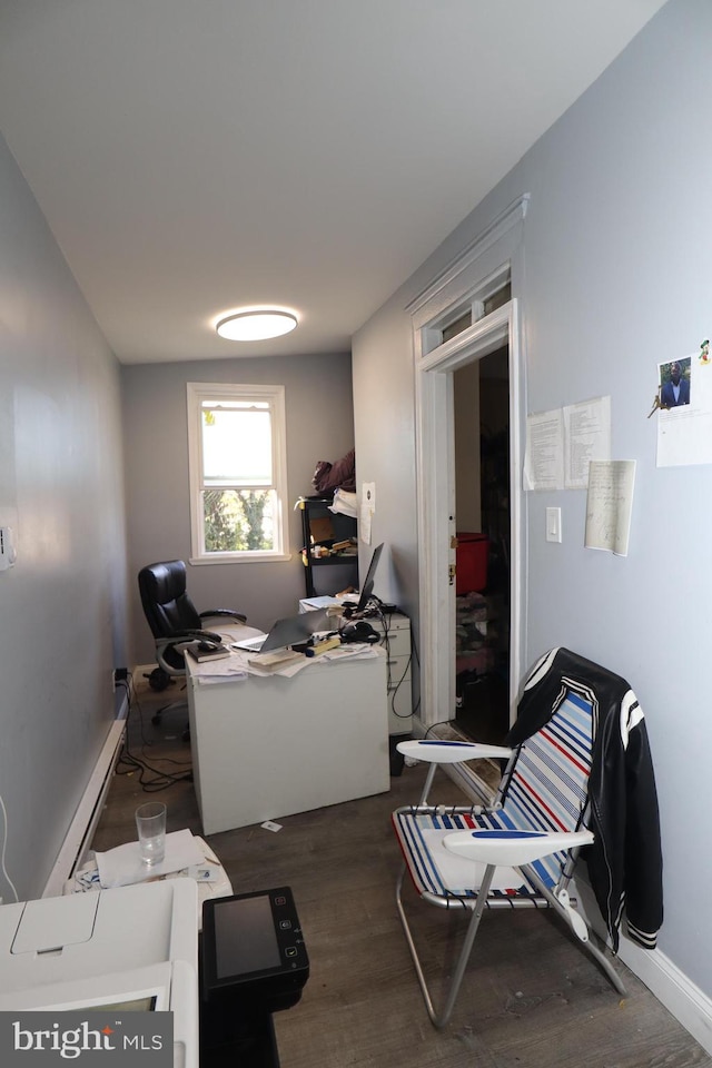 home office with dark hardwood / wood-style floors