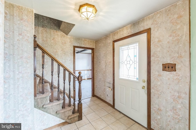 foyer with light tile patterned flooring