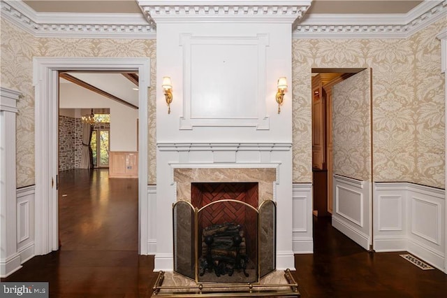 interior space with crown molding and hardwood / wood-style flooring