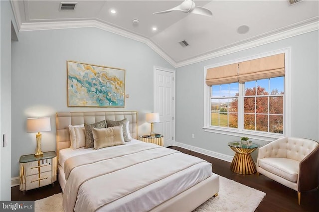 bedroom with ornamental molding, ceiling fan, dark wood-type flooring, and vaulted ceiling