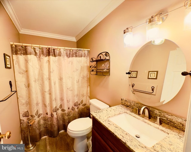 bathroom featuring a shower with shower curtain, ornamental molding, vanity, hardwood / wood-style floors, and toilet