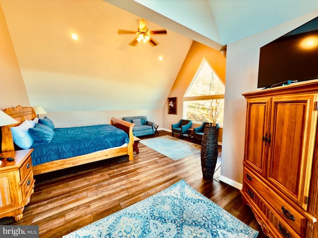 bedroom with lofted ceiling, ceiling fan, and dark hardwood / wood-style floors