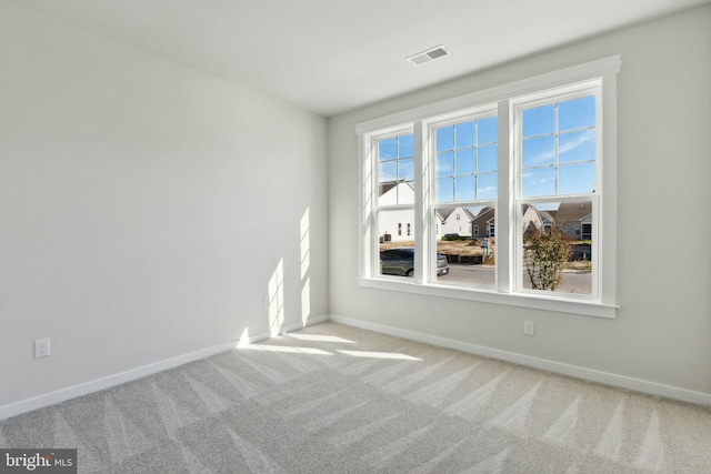 empty room featuring carpet floors