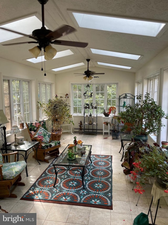 sunroom / solarium with ceiling fan and vaulted ceiling