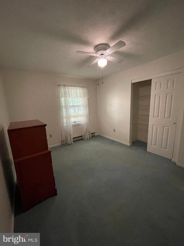 carpeted bedroom featuring a closet and ceiling fan