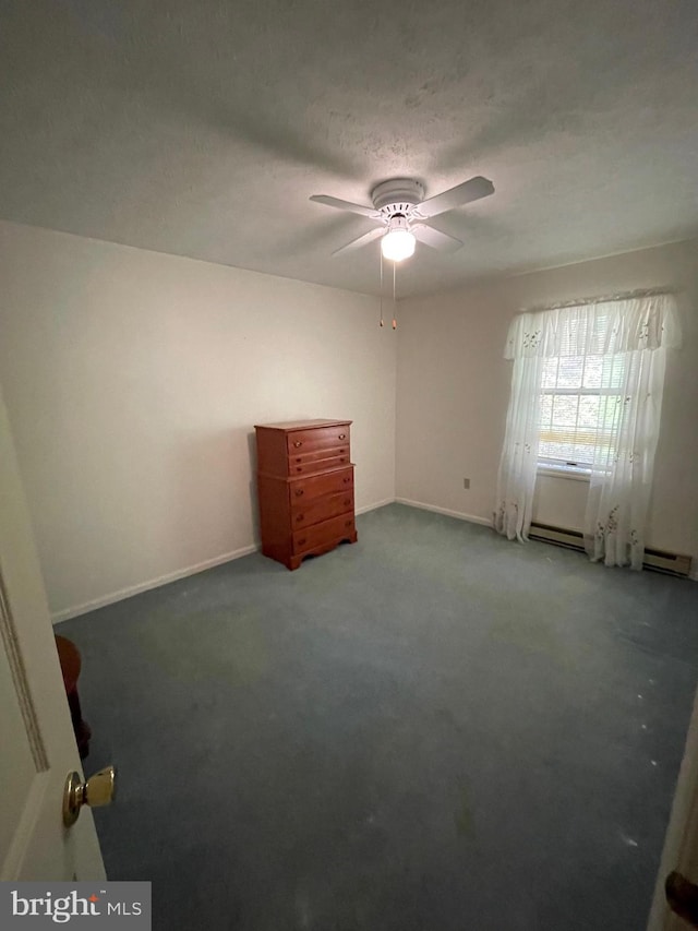 unfurnished bedroom featuring baseboard heating, a textured ceiling, carpet floors, and ceiling fan