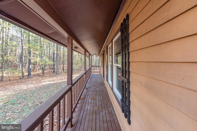 wooden deck featuring covered porch