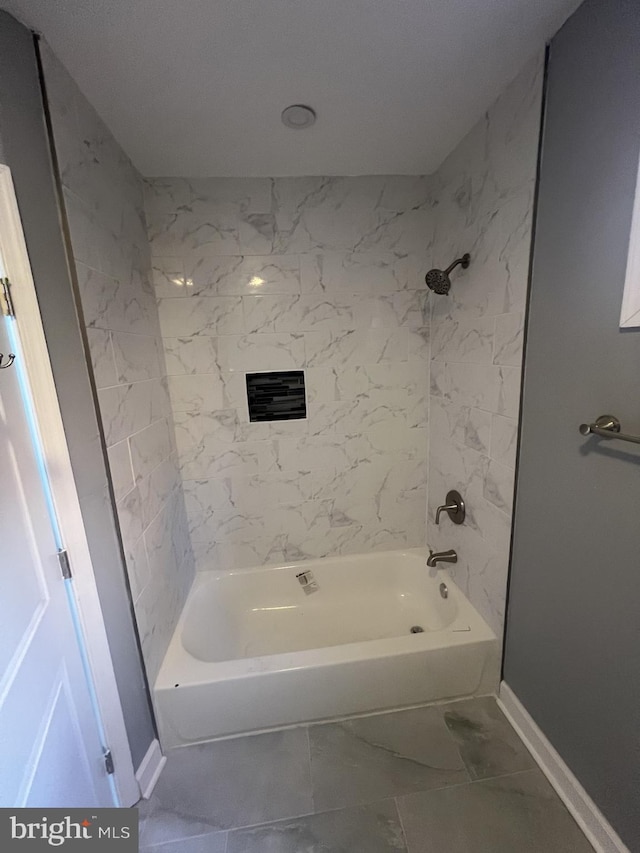 444 E 28th St, Baltimore, MD 21218 - bathroom featuring baseboards, tub / shower combination, and marble finish floor