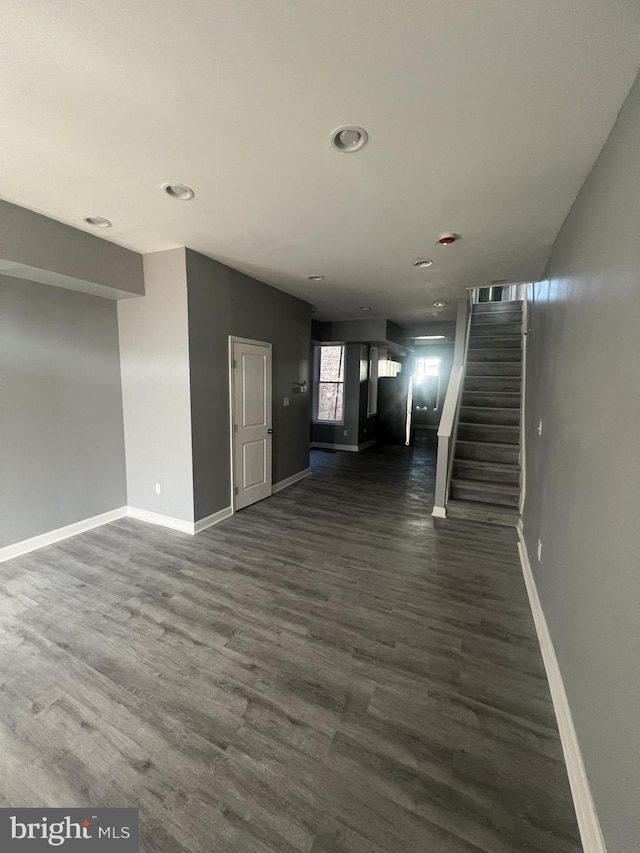 444 E 28th St, Baltimore, MD 21218 - unfurnished living room with baseboards, recessed lighting, and stairway