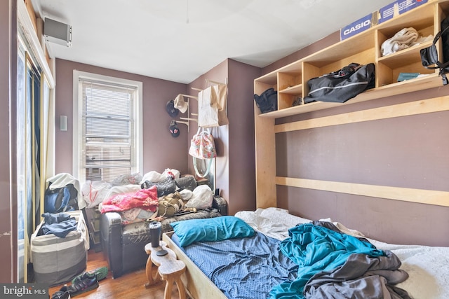 bedroom featuring wood-type flooring