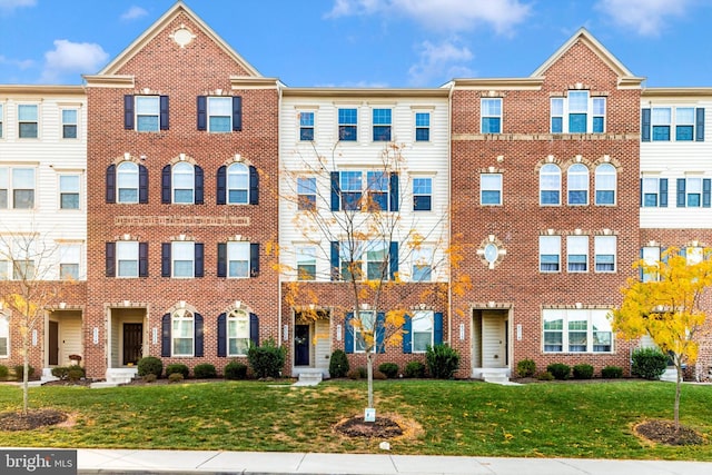 view of property with a front yard