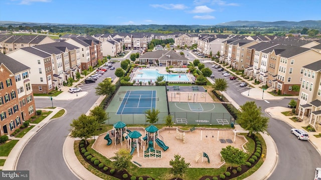 birds eye view of property featuring a mountain view