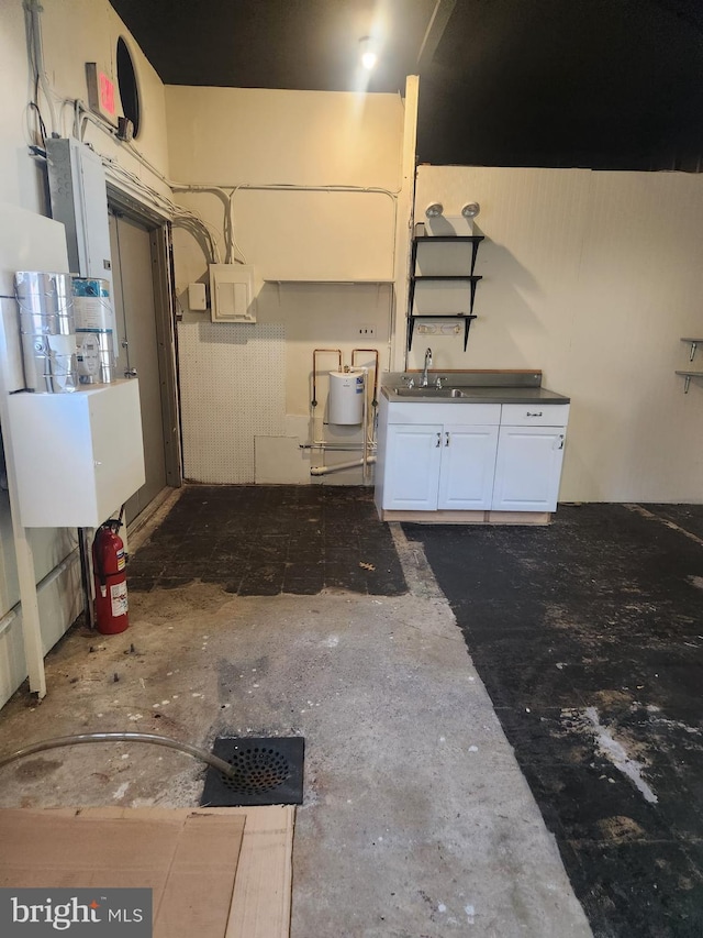230 Holmes Rd, Holmes, PA 19043 - garage with a sink and electric panel