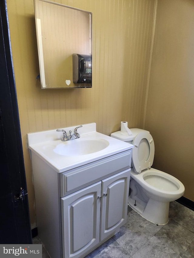 230 Holmes Rd, Holmes, PA 19043 - half bath featuring toilet, baseboards, and vanity