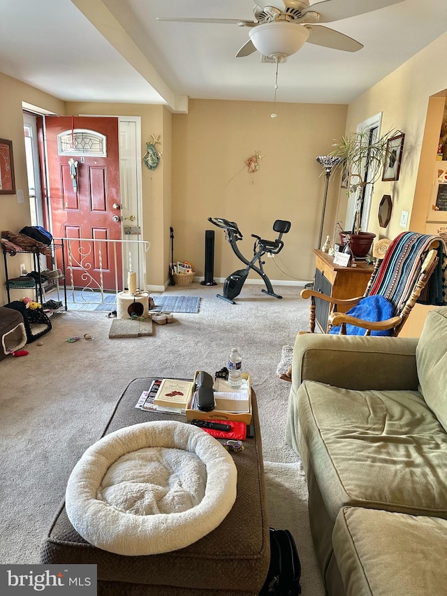 living room with carpet floors and ceiling fan