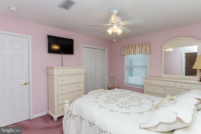 carpeted bedroom with ceiling fan and a closet