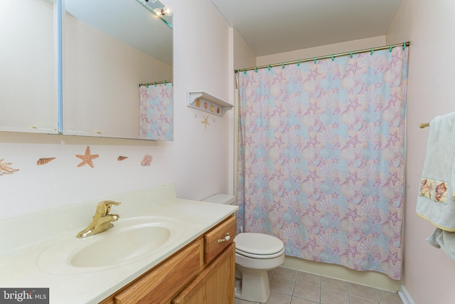 bathroom featuring vanity, tile patterned floors, toilet, and a shower with curtain