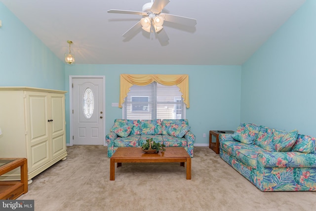 carpeted living room featuring lofted ceiling and ceiling fan