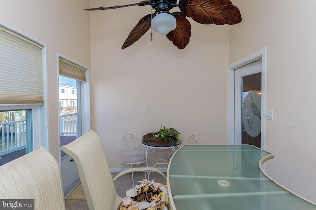 dining room featuring carpet flooring