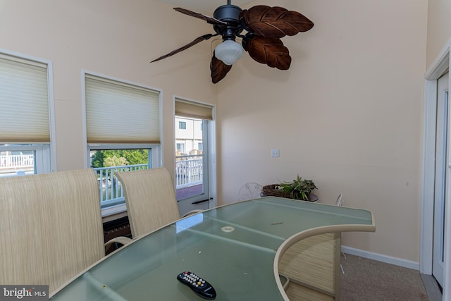 interior space featuring carpet and ceiling fan