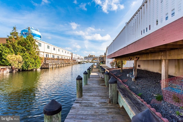 view of dock with a water view