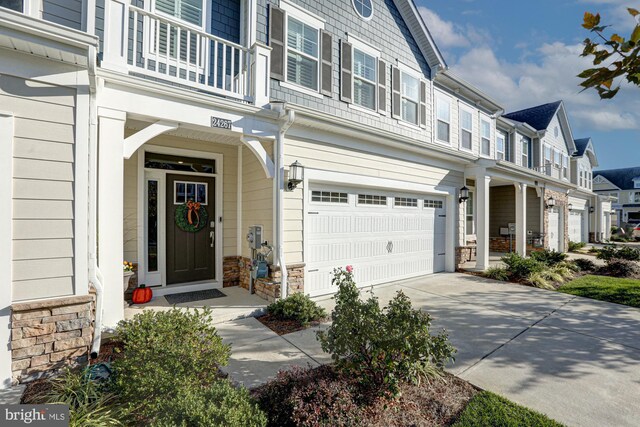 view of exterior entry featuring a garage