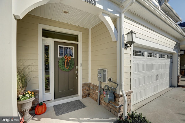 property entrance with a garage