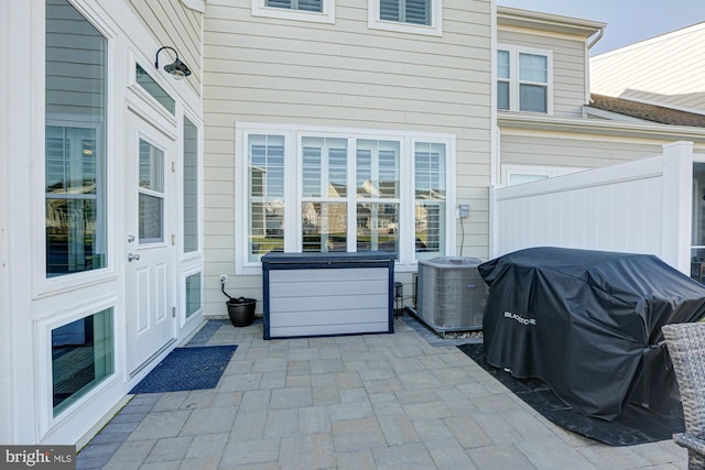 view of patio / terrace with central AC unit and grilling area