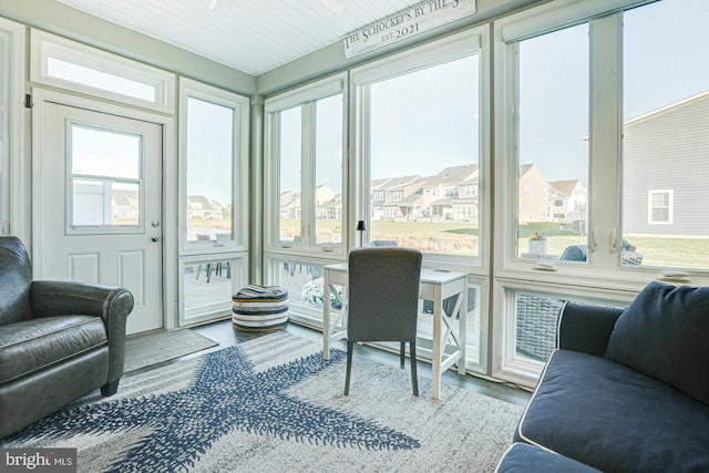 sunroom with wooden ceiling