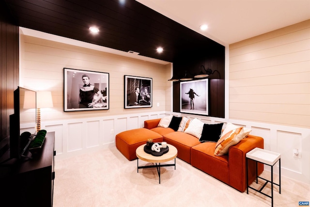 3076 Horizon Rd, Charlottesville, VA 22902 - carpeted living area with wood walls, a decorative wall, and recessed lighting