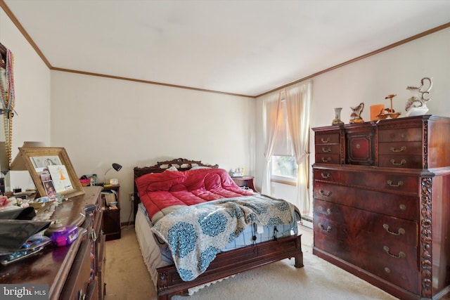 carpeted bedroom with ornamental molding