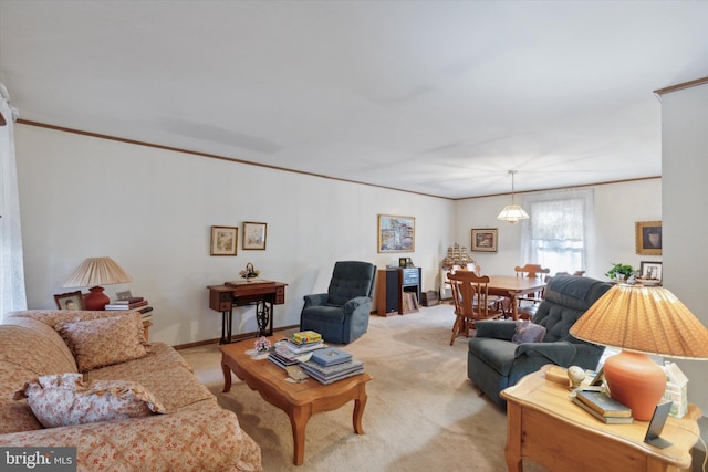 carpeted living room featuring crown molding