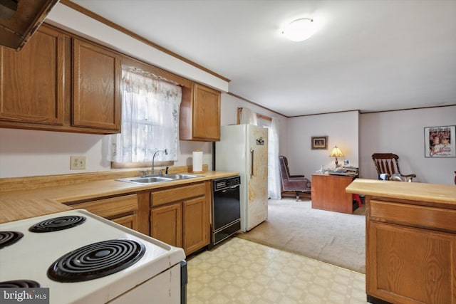 kitchen with white appliances, light carpet, and sink